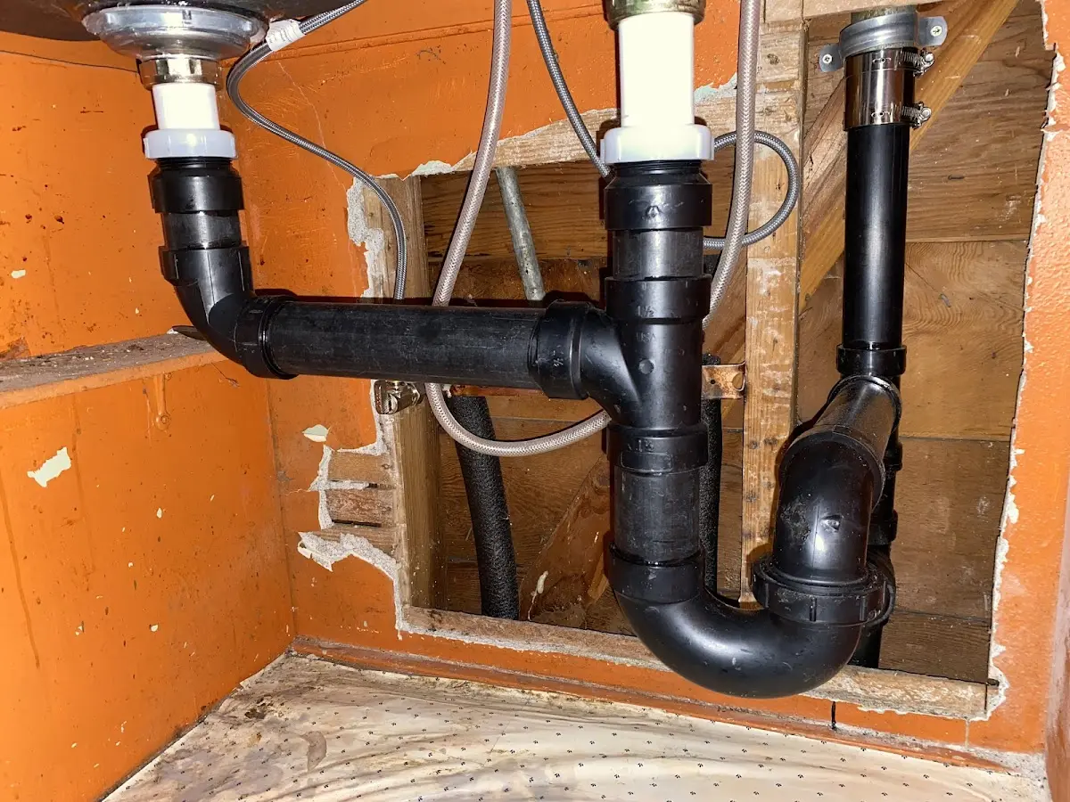 Professional Garbage Disposal Repair equipment and tools on the job in Dry Run
